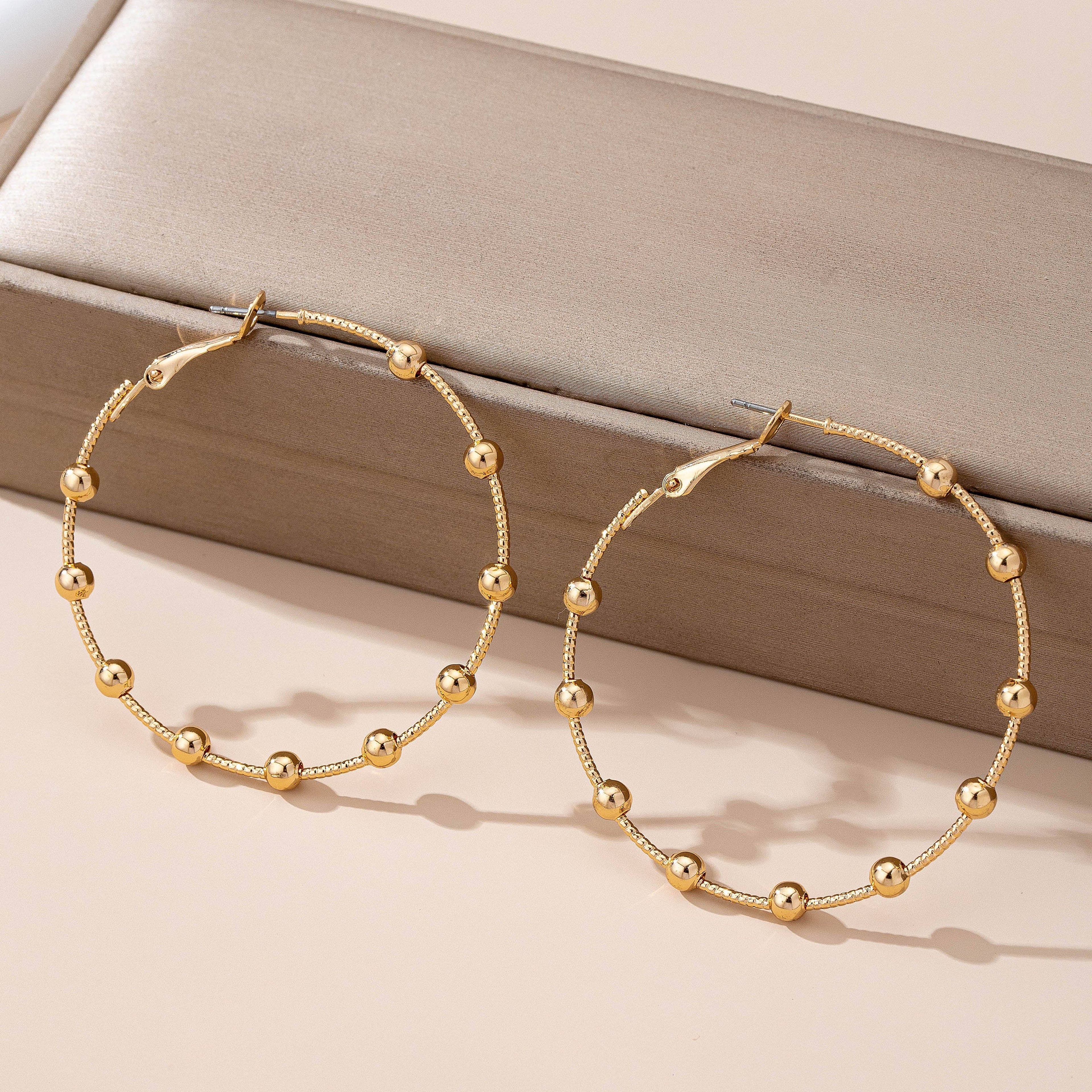 Classic Gold Ball Beaded Station Hoop Earrings | 80E61576